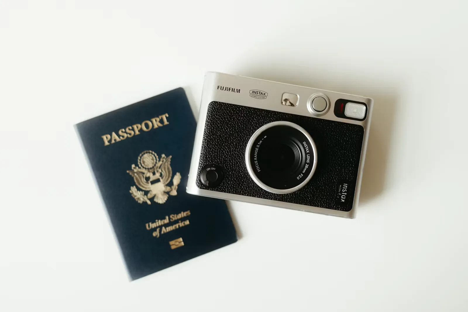 A passport and travel essentials laid out ahead of a first clinical internship abroad