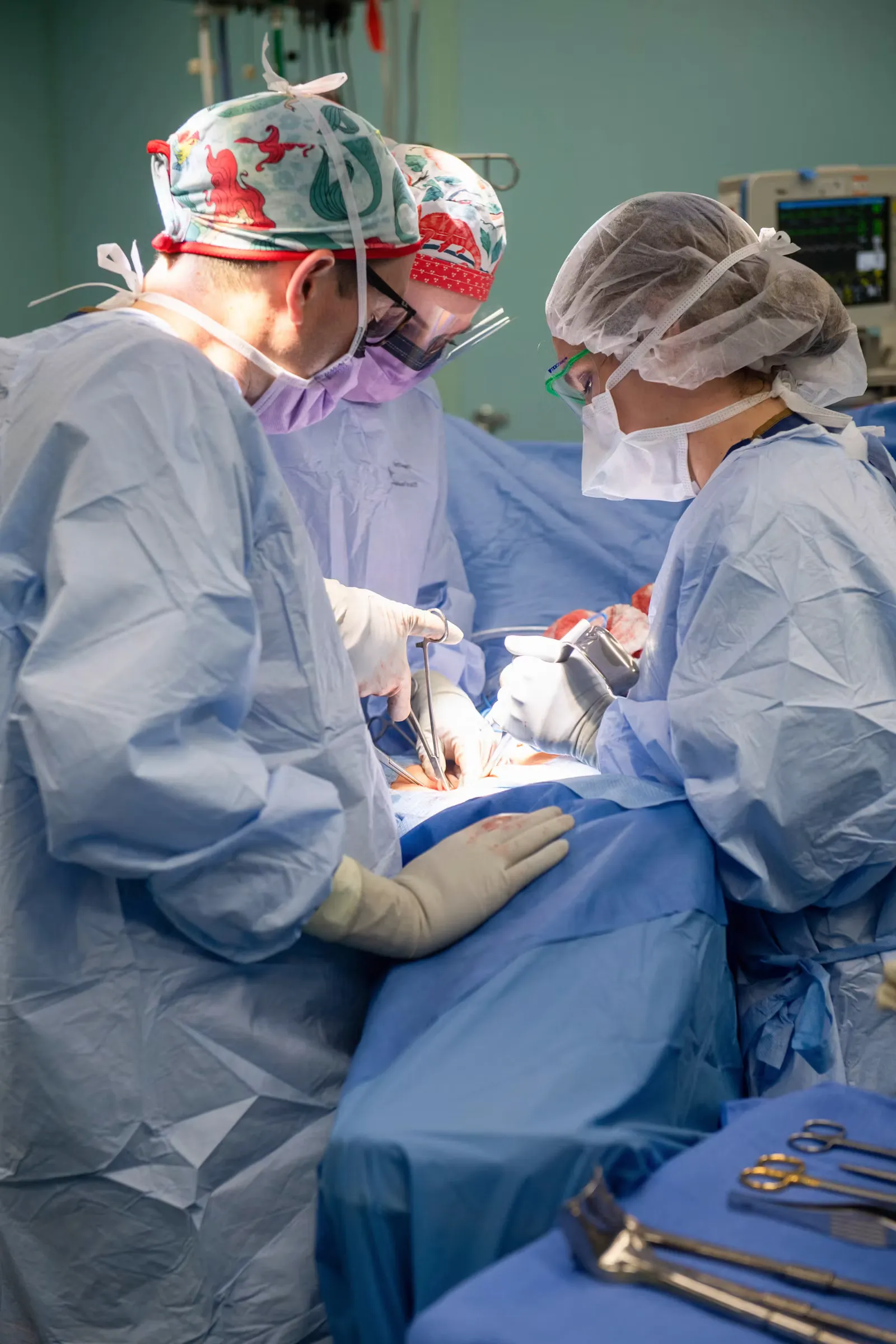 Surgical team performing an operation in a hospital operating theatre, similar to the supervised theatre rotations at Karapitiya Teaching Hospital