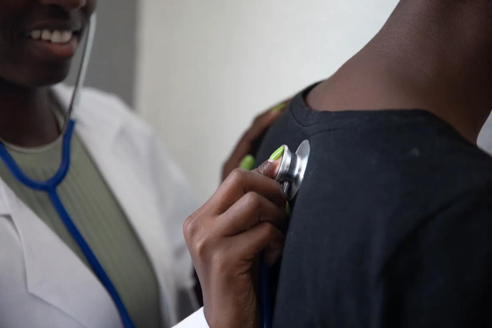 Healthcare professional holding a stethoscope, representing the hands-on ward work of a practical year abroad placement