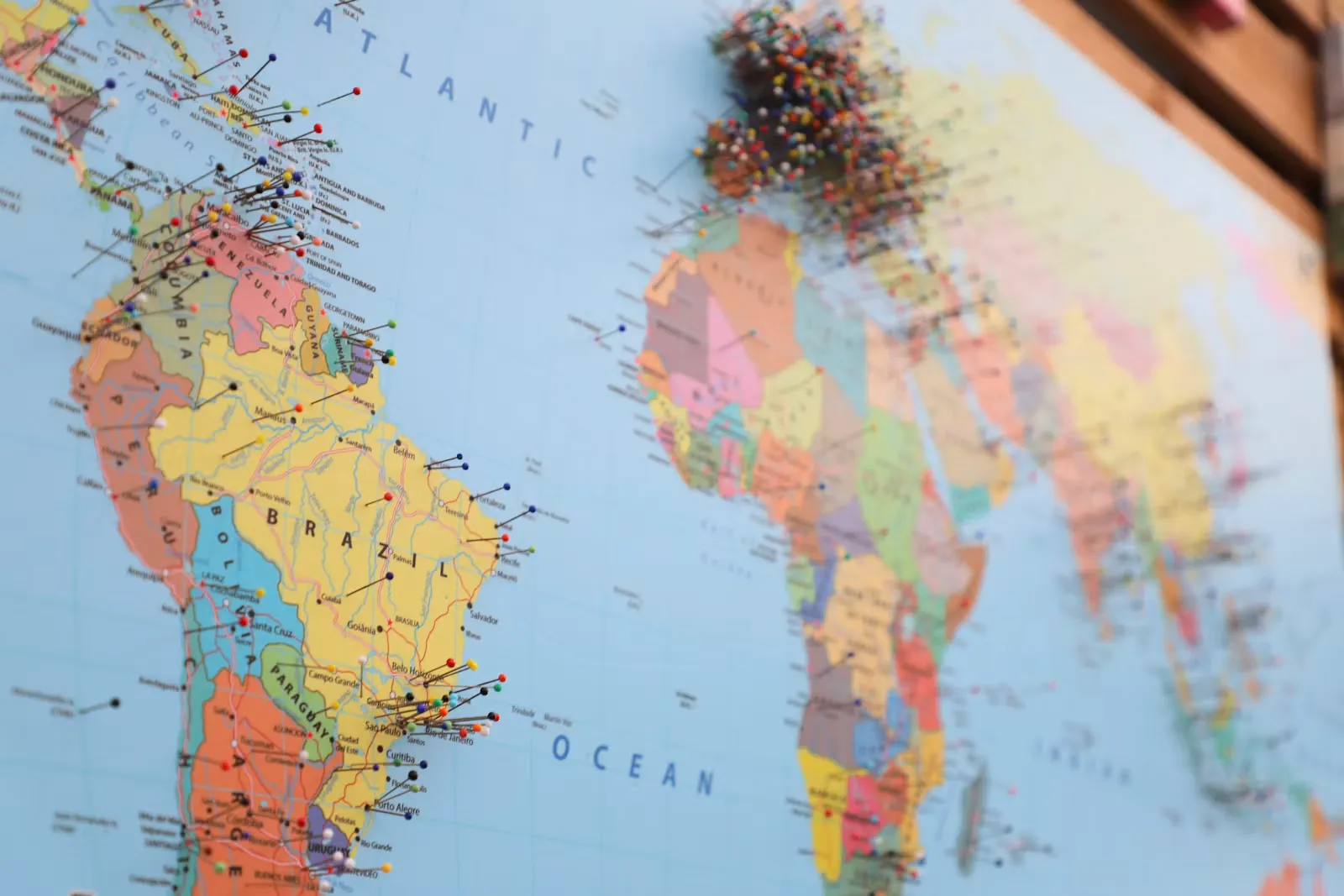 A world map marked with pins, symbolizing planning where to complete a practical year abroad