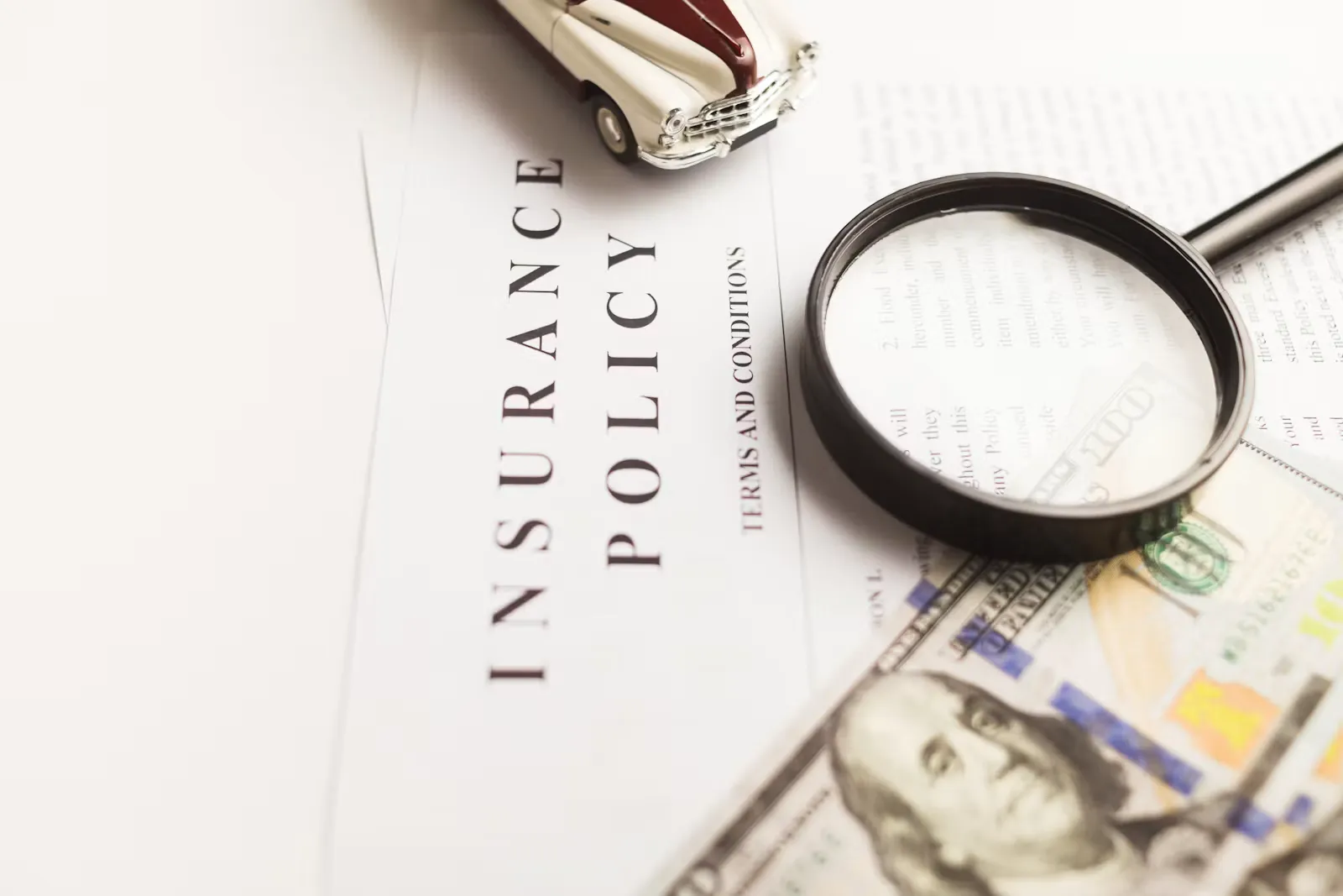 A magnifying glass resting on a printed document